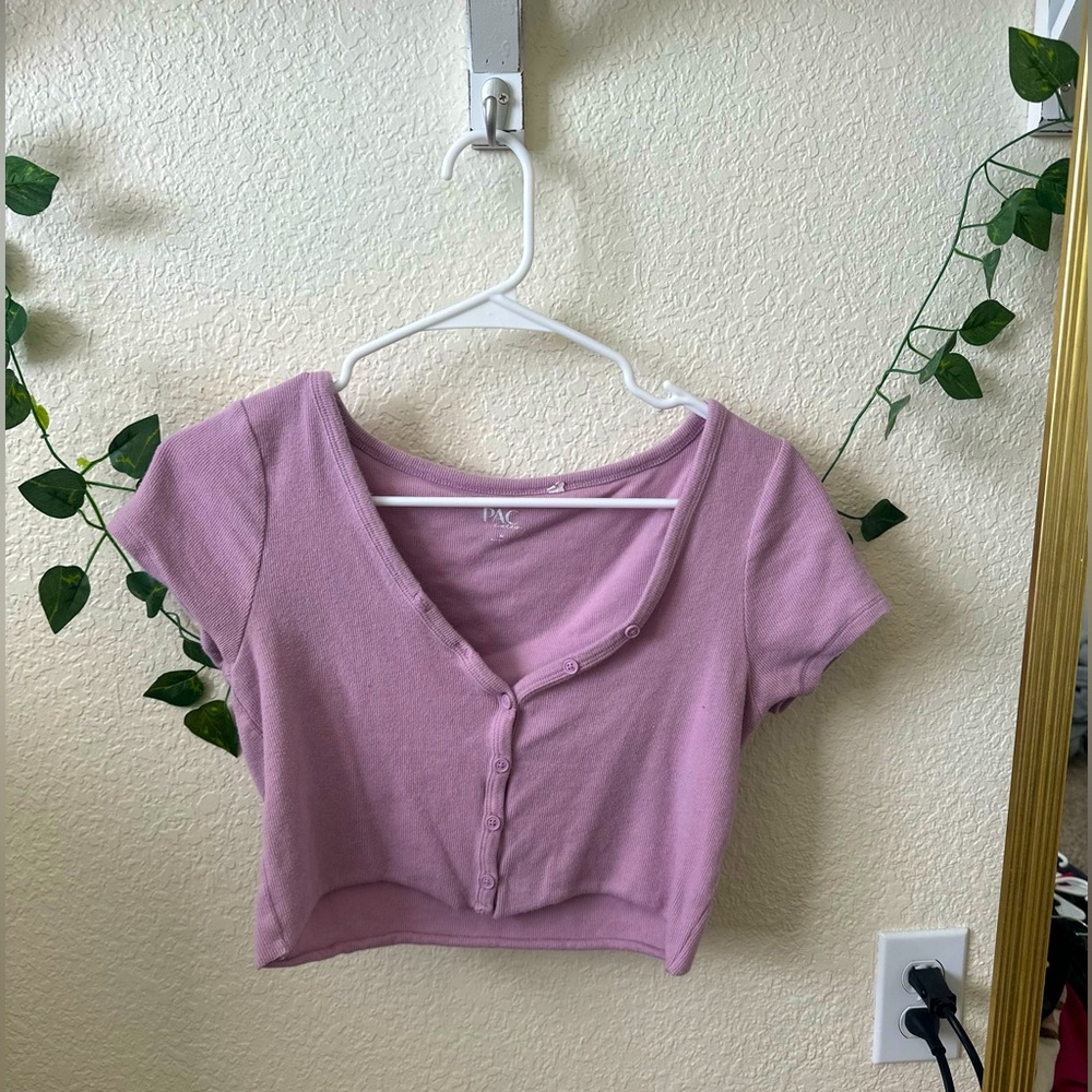 This top is stretchy but is cropped! Super cute